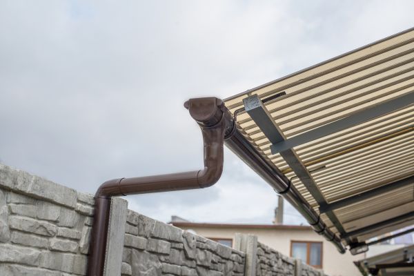 Plastic Downspout Installation in Niles